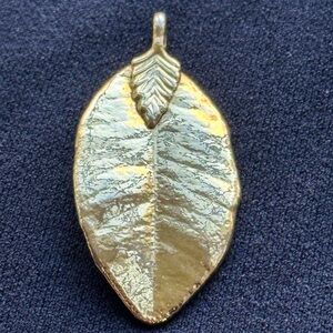 Gold Colored Metal Coated Tea Leaf Pendant Necklace